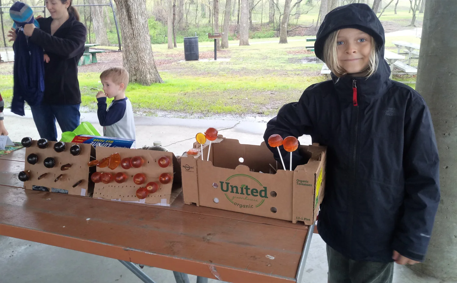 A BCHEF student sharing a handmade project at a community fair